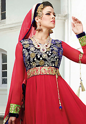 The glamorous silhouette to meet your most dire fashion needs. The dazzling red georgette anarkali churidar suit have amazing embroidery and velvet patch work is done with zari and stone work. Beautiful embroidery work on kameez is stunning. The entire ensemble makes an excellent wear. Matching santoon churidar and chiffon dupatta is available with this suit. Slight Color variations are possible due to differing screen and photograph resolutions.