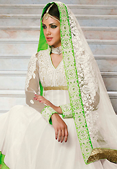 Your search for elegant look ends here with this lovely suit. The dazzling white georgette anarkali churidar suit have amazing embroidery patch work is done with zari, sequins, stone and lace work. Beautiful embroidery work on kameez is stunning. The entire ensemble makes an excellent wear. Matching santoon churidar and net dupatta is available with this suit. Slight Color variations are possible due to differing screen and photograph resolutions.