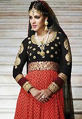 It is color this season and bright shaded suits are really something that is totally in vogue. The dazzling red and black georgette anarkali churidar suit have amazing embroidery patch work is done with floral print, zari and stone work. Beautiful embroidery work on kameez is stunning. The entire ensemble makes an excellent wear. Matching black santoon churidar and black net dupatta is available with this suit. Slight Color variations are possible due to differing screen and photograph resolutions.