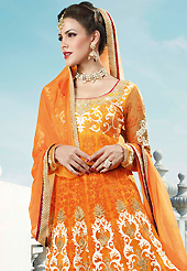 Breathtaking collection of suits with stylish embroidery work and fabulous style. The dazzling light orange net anarkali churidar suit have amazing embroidery patch work is done with resham, zari, stone and beads work. Beautiful embroidery work on kameez is stunning. The entire ensemble makes an excellent wear. Matching santoon churidar and chiffon dupatta is available with this suit. Slight Color variations are possible due to differing screen and photograph resolutions.