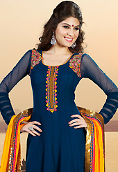 Dreamy variation on shape and forms compliment your style with tradition. The dazzling steel blue faux georgette anarkali churidar suit have amazing embroidery patch work is done with resham, zari, stone and lace work. The entire ensemble makes an excellent wear. Matching santoon churidar and dark yellow chiffon dupatta is available with this suit. Slight Color variations are possible due to differing screen and photograph resolutions.