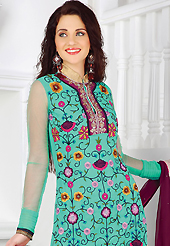 It is color this season and bright shaded suits are really something that is totally in vogue. The dazzling sea green faux georgette churidar suit have amazing embroidery patch work is done with resham, sequins, stone, beads and lace work. The entire ensemble makes an excellent wear. Contrasting dark magenta churidar and dark magenta chiffon dupatta is available with this suit. Slight Color variations are possible due to differing screen and photograph resolutions.