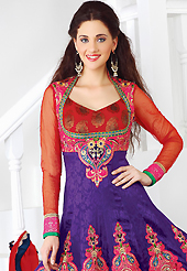 The most beautiful refinements for style and tradition. The dazzling purple and red faux crepe jacquard anarkali churidar suit have amazing embroidery patch work is done with resham, zari, sequins, stone and lace work. The entire ensemble makes an excellent wear. Matching red santoon churidar and red chiffon dupatta is available with this suit. Slight Color variations are possible due to differing screen and photograph resolutions.