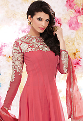 Get ready to sizzle all around you by sparkling suit. The dazzling pink georgette churidar suit have amazing embroidery patch work is done with resham, sequins and stone work. Beautiful embroidery work on kameez is stunning. The entire ensemble makes an excellent wear. Matching santoon churidar and chiffon dupatta is available with this suit. Slight Color variations are possible due to differing screen and photograph resolutions.