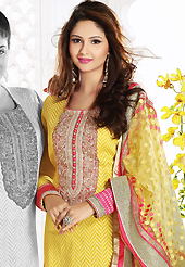 Breathtaking collection of suits with stylish embroidery work and fabulous style. The dazzling yellow and Light Red banarasi jacquard churidar suit have amazing embroidery patch work is done with resham, zari, sequins, stone, beads and lace work. Beautiful embroidery work on kameez is stunning. The entire ensemble makes an excellent wear. Matching churidar and net dupatta is available with this suit. Slight Color variations are possible due to differing screen and photograph resolutions.