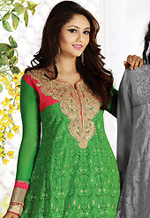 Take a look on the changing fashion of the season. The dazzling green net churidar suit have amazing embroidery patch work is done with resham, zari, sequins, stone, cutdana and lace work. Beautiful embroidery work on kameez is stunning. The entire ensemble makes an excellent wear. Matching churidar and dupatta is available with this suit. Slight Color variations are possible due to differing screen and photograph resolutions.