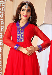 It is color this season and bright shaded suits are really something that is totally in vogue. The dazzling red net readymade churidar suit have amazing embroidery patch work is done with zari woven and brooch buttons work. The entire ensemble makes an excellent wear. Matching churidar and dupatta is available with this suit. Slight Color variations are possible due to differing screen and photograph resolutions.