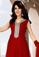 A desire that evokes a sense of belonging with a striking details. The dazzling red net readymade churidar suit have amazing embroidery patch work is done with stone and cutdana work. The entire ensemble makes an excellent wear. Matching churidar and dupatta is available with this suit. Slight Color variations are possible due to differing screen and photograph resolutions.