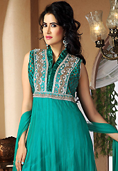 The color range from natural shades looks ravishing. The dazzling turquoise green net readymade churidar suit have amazing embroidery patch work is done with zari, stone and cutdana work. The entire ensemble makes an excellent wear. Matching churidar and dupatta is available with this suit. Slight Color variations are possible due to differing screen and photograph resolutions.