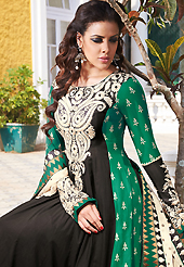 Outfit is a novel ways of getting yourself noticed. The dazzling black and green lawn cotton churidar suit have amazing embroidery patch work is done with resham and stone work. The entire ensemble makes an excellent wear. Matching cambric cotton churidar and off white chiffon dupatta is available with this suit. Slight Color variations are possible due to differing screen and photograph resolutions.