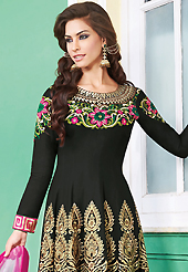 The glamorous silhouette to meet your most dire fashion needs. The dazzling black lawn cotton anarkali churidar suit have amazing embroidery patch work is done with resham and beads work. The entire ensemble makes an excellent wear. Contrasting pink cambric cotton churidar and shaded chiffon dupatta is available with this suit. Slight Color variations are possible due to differing screen and photograph resolutions.