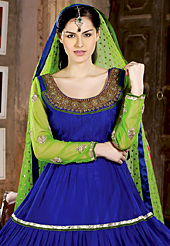 The fascinating beautiful subtly garment with lovely patterns. The dazzling royal blue net anarkali churidar suit have amazing embroidery patch work is done with zari, stones, beads and lace work. Beautiful embroidery work on kameez is stunning. The entire ensemble makes an excellent wear. Matching santoon churidar and green dupatta is available with this suit. Slight Color variations are possible due to differing screen and photograph resolutions.