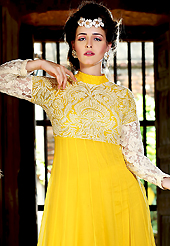 A desire that evokes a sense of belonging with a striking details. The dazzling yellow georgette anarkali churidar suit have amazing embroidery patch work is done with resham and lace work. Beautiful embroidery work on kameez is stunning. The entire ensemble makes an excellent wear. Matching churidar and dupatta is available with this suit. Slight Color variations are possible due to differing screen and photograph resolutions.