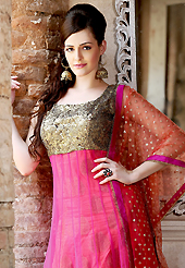 The color range from natural shades looks ravishing. The dazzling dark pink net anarkali churidar suit have amazing embroidery patch work is done with resham, zari and sequins work. Beautiful embroidery work on kameez is stunning. The entire ensemble makes an excellent wear. Matching churidar and light rust net dupatta is available with this suit. Slight Color variations are possible due to differing screen and photograph resolutions.