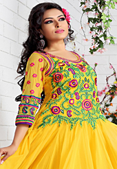 Take a look on the changing fashion of the season. The dazzling yellow net anarkali churidar suit have amazing embroidery and velvet patch work is done with resham, gold zardosi and lace work. Beautiful embroidery work on kameez is stunning. The entire ensemble makes an excellent wear. Matching santoon churidar and net dupatta is available with this suit. Slight Color variations are possible due to differing screen and photograph resolutions.