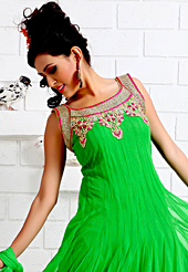 Outfit is a novel ways of getting yourself noticed. The dazzling green net anarkali churidar suit have amazing embroidery and velvet patch work is done with resham, zari and stone work. Beautiful embroidery work on kameez is stunning. The entire ensemble makes an excellent wear. Matching santoon churidar and dupatta is available with this suit. Slight Color variations are possible due to differing screen and photograph resolutions.