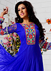 The fascinating beautiful subtly garment with lovely patterns. The dazzling royal blue net anarkali churidar suit have amazing embroidery patch work is done with resham and gold zardosi work. Beautiful embroidery work on kameez is stunning. The entire ensemble makes an excellent wear. Matching santoon churidar and net dupatta is available with this suit. Slight Color variations are possible due to differing screen and photograph resolutions.