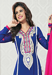 It is color this season and bright shaded suits are really something that is totally in vogue. The dazzling royal blue faux georgette churidar suit have amazing embroidery patch work is done with resham and lace work. Contrasting dark pink santoon churidar and chiffon dupatta is available with this suit. Slight Color variations are possible due to differing screen and photograph resolutions.