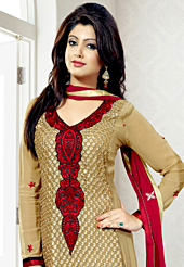 Your search for elegant look ends here with this lovely suit. The dazzling fawn faux georgette churidar suit have amazing embroidery patch work is done with resham work. Contrasting maroon santoon churidar and maroon chiffon dupatta is available with this suit. Slight Color variations are possible due to differing screen and photograph resolutions.