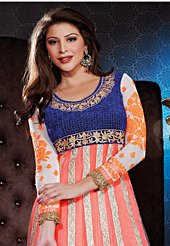 The glamorous silhouette to meet your most dire fashion needs. The dazzling dark peach net and satin long style anarkali churidar suit have amazing embroidery patch work is done with resham, zari and lace work. Beautiful embroidery work on kameez is stunning. The entire ensemble makes an excellent wear. Contrasting white santoon churidar and shaded chiffon dupatta is available with this suit. Slight Color variations are possible due to differing screen and photograph resolutions.