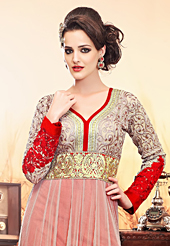 Take a look on the changing fashion of the season. The dazzling off white and red net anarkali churidar suit have amazing embroidery patch work is done with resham work. Beautiful embroidery work on kameez is stunning. The entire ensemble makes an excellent wear. Matching red santoon churidar and red chiffon dupatta is available with this suit. Slight Color variations are possible due to differing screen and photograph resolutions.