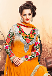 The fascinating beautiful subtly garment with lovely patterns. The dazzling orange georgette anarkali churidar suit have amazing embroidery patch work is done with resham, zari and lace work. Beautiful embroidery work on kameez is stunning. The entire ensemble makes an excellent wear. Contrasting off white santoon churidar and orange chiffon dupatta is available with this suit. Slight Color variations are possible due to differing screen and photograph resolutions.