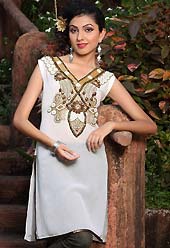 White chiffon tunis is simple designed with beautiful embroidered patch work on neckline which is embllished with resham, zari sequins, stone and sitara works. This readymade indo western tunic use for casual purpose.  Slight Color variations are possible due to differing screen and photograph resolutions.