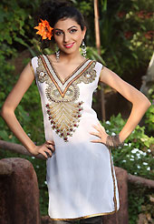 White chiffon tunis is simple designed with beautiful embroidered patch work on neckline which is embllished with resham, zari sequins, stone and sitara works. This readymade indo western tunic use for casual purpose.  Slight Color variations are possible due to differing screen and photograph resolutions.