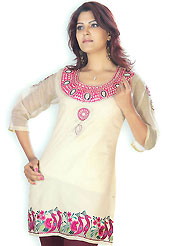 Light Fawn cotton tunic is nicely designed with resham embroidery patch work on neckline and sleeves done with resham work. Amazing peacock patterned border is highlighting the beauty of this tunic. This is a perfect casual wear. Slight Color variations are possible due to differing screen and photograph resolutions.
