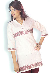 This Peach cotton tunic is designed with resham embroidery work on all over in floral patterns. This is a perfect casual wear. Slight Color variations are possible due to differing screen and photograph resolutions.