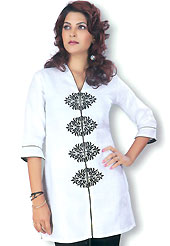 This White cotton tunic is designed with resham embroidery work in floral patterns. This is a perfect casual wear. Slight Color variations are possible due to differing screen and photograph resolutions.