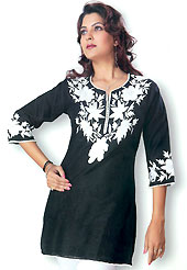 This Black cotton tunic is designed with resham embroidery patch work on neckline in floral patterns. This is a perfect casual wear. Slight Color variations are possible due to differing screen and photograph resolutions.