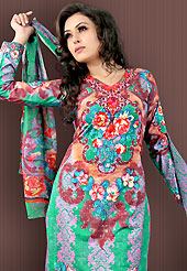 Arresting embroidery designer tunics with cool color. This green and brown faux crepe tunic is designed with beautiful combination of digital print and sequins work in form of floral motifs. Beautiful printed faux georgette stole is available with this tunic. Bottom shown in the image is just for photography purpose. Slight Color variations are possible due to differing screen and photograph resolutions.