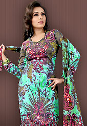 Stylish and beautiful work tunic. This sea green and olive faux crepe tunic is designed with beautiful combination of digital print and sequins work in form of abstract motifs. Beautiful printed faux georgette stole is available with this tunic. Bottom shown in the image is just for photography purpose. Slight Color variations are possible due to differing screen and photograph resolutions.