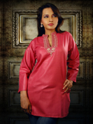 A beautiful maroon cotton silk mid length kurti for a refreshing look.
With fabulous machine work on the neckline.
Furnished with V necklines and and full sleeves.
Suitable for both casual and formal wear.