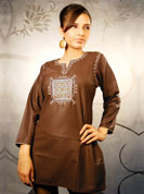 Be the centre of attraction with this lovely brown mid length cotton silk kurti.
The kurti has a traditional patch in the centre combined with some beautiful floral design on the neck and the shoulders.
Suitable for casual wear and some occasions.