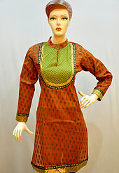 Simple captivating cotton kurti is nicely designed with butti print on all over. Quilted fabric patch work on neck with lace. Golden border on kurti and sleeves. Color of this kurti is orange and green. It’s a daily wear drape. Slight Color variations are possible due to differing screen and photograph resolutions.