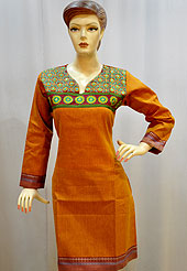 Traditional patterned used on this kurti is nice. Plain Cotton kurti has beautiful traditional touched artwork embroidery on neckline done with dhaga and mirror with zari border on bottom and sleeves. This kurti color is orange. It’s a casual wear drape. Slight Color variations are possible due to differing screen and photograph resolutions.