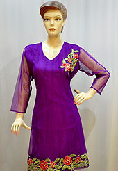 Arresting and beautiful A-line patterned net kurti is nicely designed with embroidered border on bottom done with resham. Embroidery patch on shoulder is graceful. Color of kurti is violet. It’s a casual and party wear drape. Slight Color variations are possible due to differing screen and photograph resolutions.