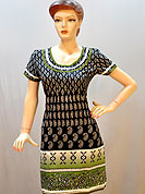Arresting and beautiful cotton kurti is nicely designed with urban pattern butti print work . color mixing in bottom is graceful. Color of kurti is black and green. It’s a casual wear drape. Slight Color variations are possible due to differing screen and photograph resolutions.
