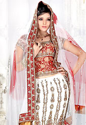 Let your personality speak for you this bridal lehenga embellished with embroidery work. This white and maroon crepe silk fish tail lehenga choli is nicely embroidered and velvet patch work done with sequins, stone, kasab, zardosi and cut work in form of floral motifs. All over embroidery work on lehenga is stunning. The beautiful embroidery on lehenga made it awesome and gives you stylish and attractive look to others. Matching brocade choli and net dupatta is availble with this lehenga. The bust size of the choli can be customized upto 38 inches. Slight Color variations are possible due to differing screen and photograph resolutions.