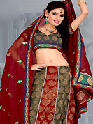 Get ready to sizzle all around you by sparkling lehenga. This maroon and deep green lehenga choli is nicely embroidered and patch work done with  resham, zari and sequins work in form of floral motifs. Beautiful embroidery work on lehenga is stunning. The beautiful embroidery on lehenga made it awesome and gives you stylish and attractive look to others. Matching and dupatta is availble with this lehenga. Slight Color variations are possible due to differing screen and photograph resolutions.