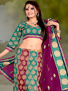 Embroidered lehengas are highly in order on a range of occasions such as wedding, formal party and festivals. This turquoise green and burgundy lehenga choli is nicely embroidered and patch work done with  resham, zari and sequins work in form of floral motifs. Beautiful embroidery work on lehenga is stunning. The beautiful embroidery on lehenga made it awesome and gives you stylish and attractive look to others. Matching and dupatta is availble with this lehenga. Slight Color variations are possible due to differing screen and photograph resolutions.