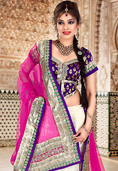 Let your personality speak for you this bridal lehenga embellished with embroidery work. This magenta and light cream net A-Line lehenga choli is nicely embroidered and patch work done with resham, sequins, stone and lace work in form of floral motifs. Embroidery on lehenga made it awesome and gives you stylish and attractive look to others. Contrasting dark purple art silk choli and magenta net dupatta is availble with this lehenga. Accessories shown in the image is just for photography purpose. Slight Color variations are possible due to differing screen and photograph resolutions.