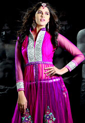 It’s cool and has a very modern look to impress all. This magenta net lehenga choli is nicely embroidered and patch work done with stone, lace work in form of floral motifs. Embroidery long jacket style choli on lehenga is stunning. The beautiful embroidery on lehenga made it awesome and gives you stylish and attractive look to others. Matching choli and dupatta is availble with this lehenga. Slight Color variations are possible due to differing screen and photograph resolutions.