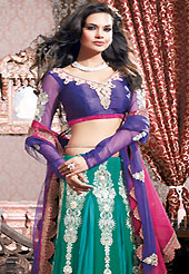Embroidered lehengas are highly in order on a range of occasions such as wedding, formal party and festivals. This turquoise green and blue lehenga choli is nicely embroidered and patch work done with resham, beads and stone work in form of floral motifs. The beautiful embroidery on lehenga made it awesome and gives you stylish and attractive look to others. Contrasting violet choli and pink and violet dupatta is availble with this lehenga. Slight Color variations are possible due to differing screen and photograph resolutions.