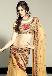 It’s cool and has a very modern look to impress all. This light fawn faux georgette lehenga choli is nicely embroidered patch work done with resham, sequins, stone and beads work in form of floral motifs. The beautiful embroidery on lehenga made it awesome and gives you stylish and attractive look to others. Matching choli and dupatta is availble with this lehenga. Choli can be customized upto 42 inches. Slight Color variations are possible due to differing screen and photograph resolutions.