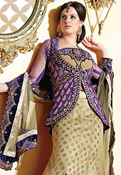 Make your collection more attractive and charming with this impressive dress. This fawn and dark purple net jacket style lehenga choli is nicely embroidered and velvet patch border is done with resham, zari, sequins and stone work. The beautiful embroidery on lehenga made it awesome and gives you stylish and attractive look to others. Matching choli, dupatta and contrasting dark purple net jacket is availble with this lehenga. Slight Color variations are possible due to differing screen and photograph resolutions.