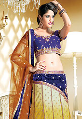 Let your personality speak for you this bridal lehenga embellished with embroidery work. This dark blue and shaded orange net lehenga choli is nicely embroidered and velvet patch border is done with resham, zari, sequins and stone work. The beautiful embroidery on lehenga made it awesome and gives you stylish and attractive look to others. Matching brocade choli and net dupatta is availble with this lehenga. Slight Color variations are possible due to differing screen and photograph resolutions.