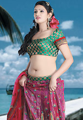 Embroidered lehengas are highly in order on a range of occasions such as wedding, formal party and festivals. This deep pink net lehenga choli is nicely embroidered patch work done with  resham, sequins and lace work. Embroidery work on lehenga is stunning. The beautiful embroidery on lehenga made it awesome and gives you stylish and attractive look to others. Contrasting green and fawn choli and dupatta is availble with this lehenga. Slight Color variations are possible due to differing screen and photograph resolutions.